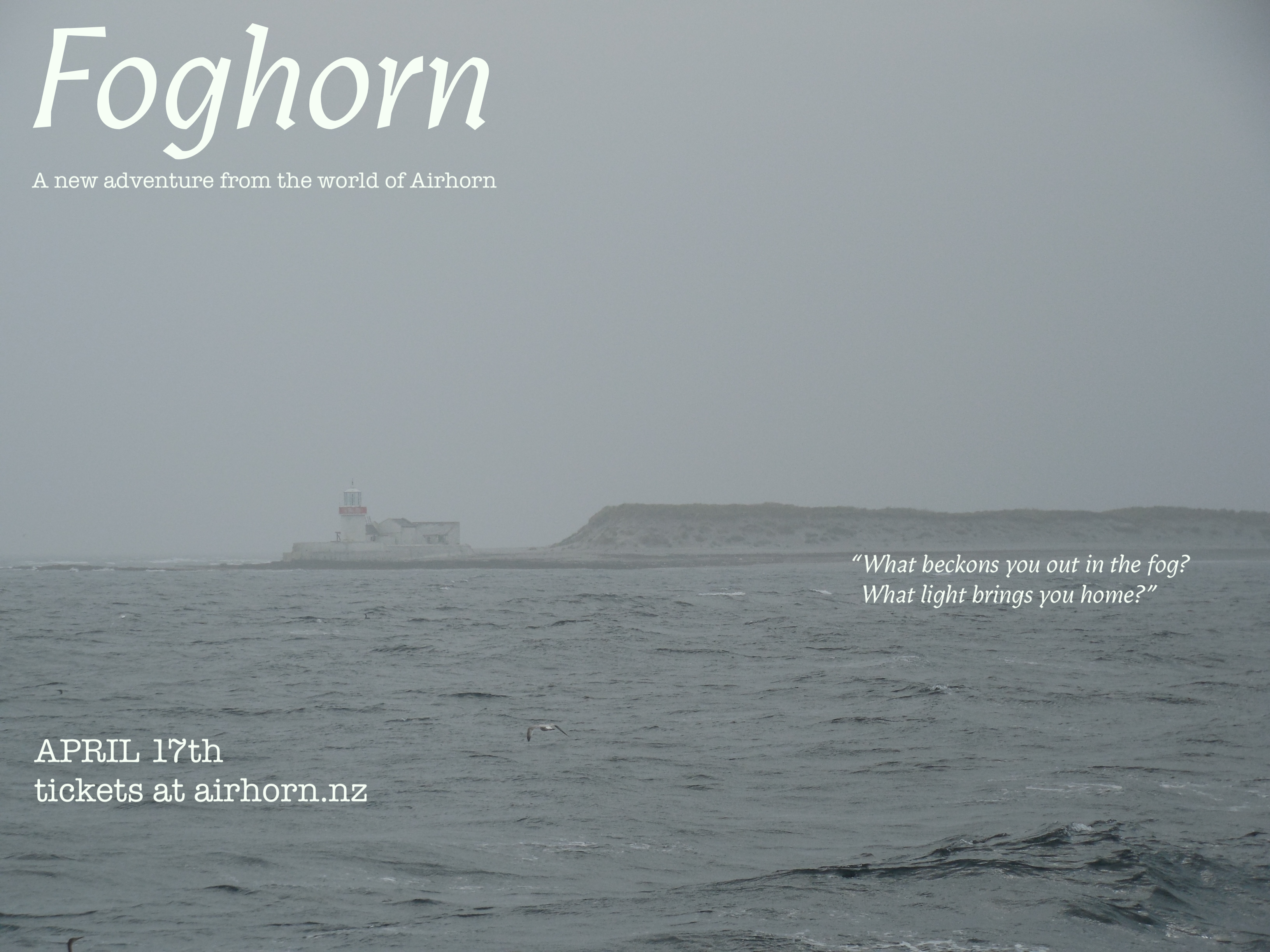 A poster showing a rocky cliff and a ligthouse